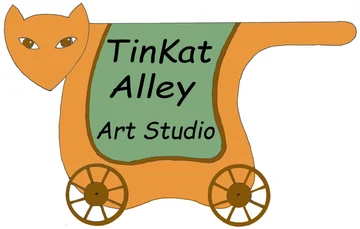 A hand-drawn orange cat pulling a cart, the Tinkat Alley logo